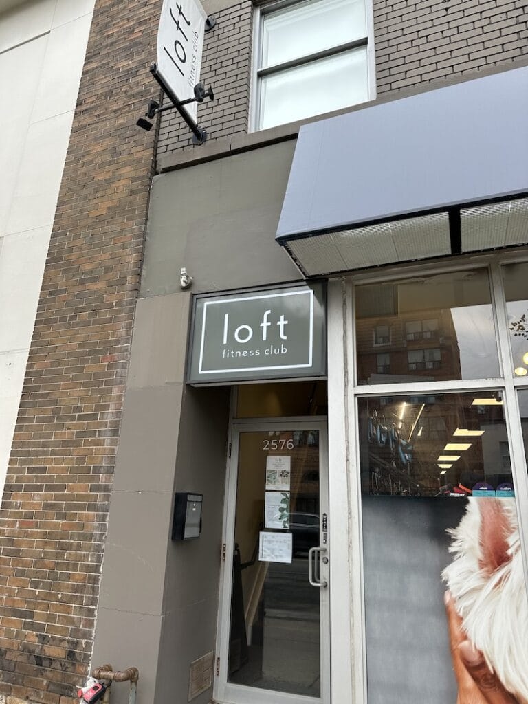Exterior of Loft Fitness Club in Midtown Toronto Ontario with the entrance directly off Yonge Street and Briar Hill Ave.